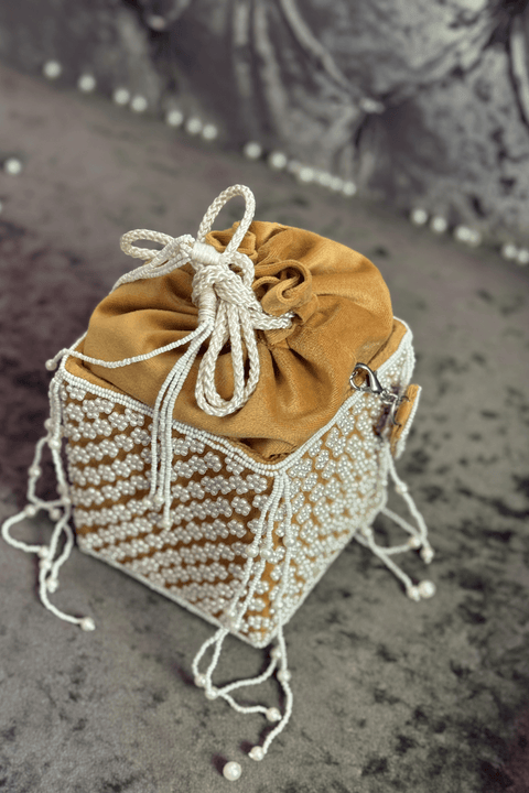 Aleena Suede Yellow Potli With Pearl Handle