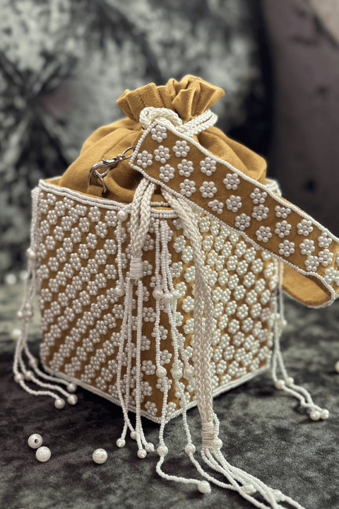 Aleena Suede Yellow Potli With Pearl Handle